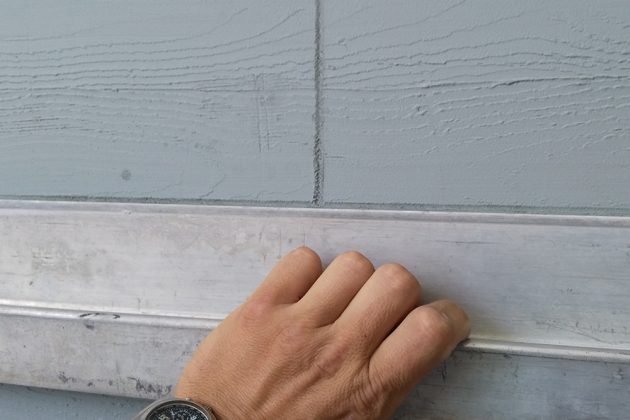 Fasáda s imitací dřeva na projektu horských apartmánů