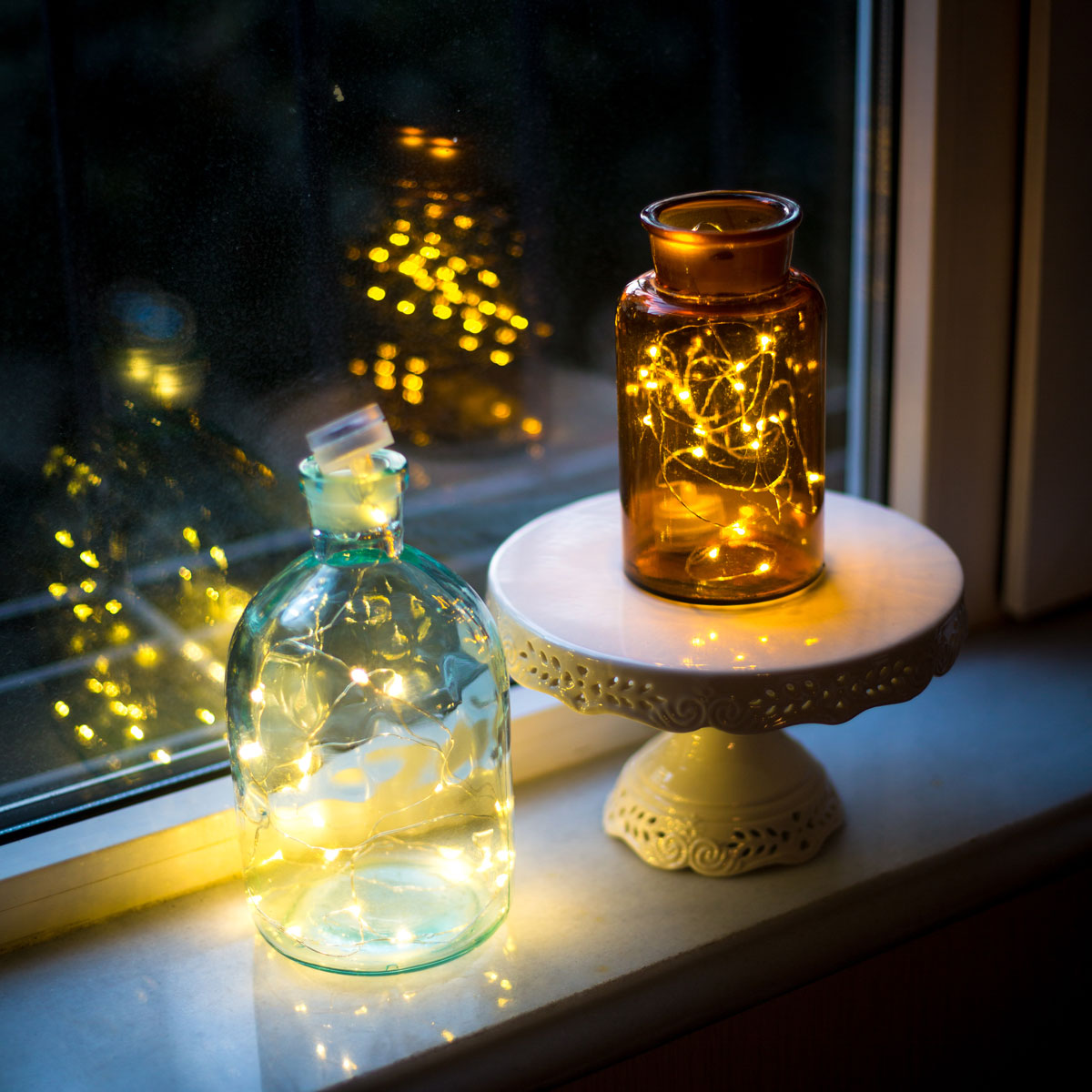 Světýlka ve skleněných lahvích a nádobách
